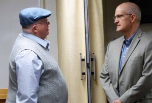 Sparks Tribune Former Sparks City Manager Shaun Carey, chairman of the Public Schools Overcrowding and Repair Needs Committee (left), talks to Pete Etchart, chief operations officer for the Washoe County School District, following a committee meeting.