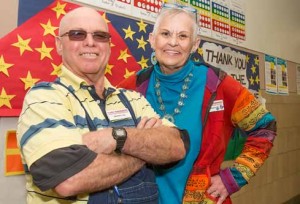  John Byrne/Tribune Hal Pagni (left) and Jeri Pedersen, participants in the Foster Grandparent Program of Northern Nevada, pose in the hallway at Robert Mitchell Elementary School in Sparks. 