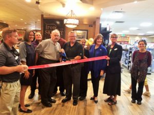 Kayla Anderson - Sparks City Councilwoman Julia Ratti, Mayor Geno Martini, Field Manager Fred Davis and Councilwoman Charlene Bybee took part in the ribbon cutting of the re-opening of the Iron Skillet at Petro in Sparks.