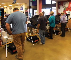 John Byrne/Tribune - Early Sparks voters cast their ballots at Raley’s in Wingfield Springs on Monday. 