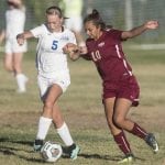 Sparks defender Citali Lopez battles for possession with Lowry’s Hailey Fernandez in a 3-1 loss at home Friday.