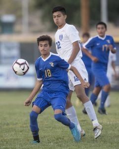 John Byrne photos/Tribune Reed outlasted Carson 2-1 at home last Wednesday.
